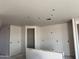 Interior view showing drywall in an open floor plan of a new home construction at 7691 W Saddlehorn Rd, Peoria, AZ 85383