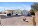 Spacious backyard with patio, BBQ, storage shed and desert landscaping for relaxing and entertaining outdoors at 7807 E Main St # Cc-98, Mesa, AZ 85207