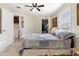 Bright bedroom with a view to the laundry room and a closet, perfect for storage at 7807 E Main St # Cc-98, Mesa, AZ 85207