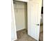 A closet with wire shelving, carpet, and a white door is shown at 7807 E Main St # Cc-98, Mesa, AZ 85207