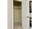 A closet with wire shelving, carpet, and a white door is shown at 7807 E Main St # Cc-98, Mesa, AZ 85207
