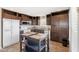 Well-equipped kitchen with abundant cabinet space, modern appliances, and a functional center island at 7807 E Main St # Cc-98, Mesa, AZ 85207