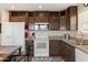 Functional kitchen space offering modern appliances, ample counter space, and cabinetry for storage at 7807 E Main St # Cc-98, Mesa, AZ 85207