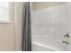 Modern bathtub and shower combination with a stylish curtain and sleek fixtures at 7807 E Main St # Cc-98, Mesa, AZ 85207