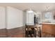 Bright dining area adjacent to the kitchen, perfect for entertaining at 9644 N 97Th Ln, Peoria, AZ 85345