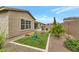 Nice backyard featuring a play structure, rock landscaping, and outdoor living space by the pool at 10148 W Avenida Del Rey --, Peoria, AZ 85383