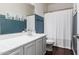 Cozy bathroom featuring a white vanity, modern fixtures, and charming decor at 10451 E Natal Ave, Mesa, AZ 85209