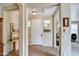 Bright foyer with tiled flooring, a view of the front door, and inviting access to the home's layout at 1155 S Annie Ln, Gilbert, AZ 85296