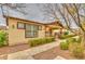 Lovely single-story home with a covered entryway, neat landscaping, and a charming, welcoming appearance at 1155 S Annie Ln, Gilbert, AZ 85296