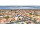 Extensive aerial view of a community featuring houses with a mix of solar panels at 12450 W Holly St, Avondale, AZ 85392