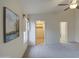 Spacious bedroom with a ceiling fan and walk-in closet at 12450 W Holly St, Avondale, AZ 85392