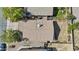 An aerial view of the home, highlighting its roof, backyard, and proximity to greenery at 12454 W Redfield Rd, El Mirage, AZ 85335