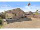 The home features a spacious backyard with desert landscaping at 12454 W Redfield Rd, El Mirage, AZ 85335