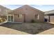 The home features a spacious backyard with desert landscaping at 12454 W Redfield Rd, El Mirage, AZ 85335