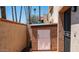 Private backyard with a storage closet featuring a white door at 1320 E Bethany Home Rd # 104, Phoenix, AZ 85014