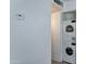 Convenient laundry area with stacked washer and dryer units at 1320 E Bethany Home Rd # 104, Phoenix, AZ 85014