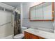 Cozy bathroom with tub/shower combo, updated vanity and medicine cabinet at 14013 N Boswell Blvd, Sun City, AZ 85351