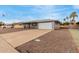 Charming single-story home with gray brick, low maintenance yard and two car garage at 14013 N Boswell Blvd, Sun City, AZ 85351