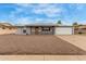 Charming single-story home with gray brick, low maintenance yard and two car garage at 14013 N Boswell Blvd, Sun City, AZ 85351