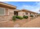 Single-story home with low-maintenance landscaping, neutral colors, and tidy front entrance at 14024 N Palm Ridge Dr, Sun City, AZ 85351