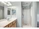 This bathroom has a walk in shower and single sink at 14932 W Lamoille Dr, Surprise, AZ 85374