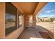 Covered patio, with a view of desert landscaping at 14932 W Lamoille Dr, Surprise, AZ 85374