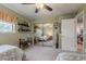 Bedroom featuring twin beds, carpet floors, and a sliding mirror closet at 15327 E Thistle Dr, Fountain Hills, AZ 85268