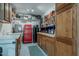 Functional garage space with utility sink, workbench, and tool storage at 15327 E Thistle Dr, Fountain Hills, AZ 85268