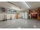 Garage featuring overhead lighting, white walls, and ample storage space at 15327 E Thistle Dr, Fountain Hills, AZ 85268