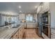 Well-equipped kitchen featuring stainless steel appliances, granite counters, and ample cabinet space at 15327 E Thistle Dr, Fountain Hills, AZ 85268