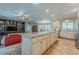 Expansive kitchen island with seating, open to living room, and lots of cabinet space at 15327 E Thistle Dr, Fountain Hills, AZ 85268