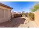 Backyard features a gravel bed, stone pavers, and an outdoor gazebo at 15334 W Via Montoya --, Sun City West, AZ 85375