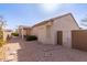 Exterior view of the home featuring covered patio and low-maintenance yard at 15334 W Via Montoya --, Sun City West, AZ 85375