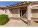 Charming front entrance with security door, manicured bushes, and low maintenance landscaping at 15334 W Via Montoya --, Sun City West, AZ 85375