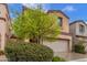 Stylish two-story home with well-manicured lawn, and a convenient two-car garage adding to the curb appeal at 1562 W Lacewood Pl, Phoenix, AZ 85045