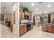 Open kitchen showcasing modern appliances, ample counter space, and seamless integration with the dining area at 1562 W Lacewood Pl, Phoenix, AZ 85045