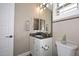 Stylish bathroom vanity with modern fixtures, neutral paint, and plenty of storage at 16935 W Cambridge Ave, Goodyear, AZ 85395