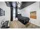 Stylish bedroom with a black ceiling, modern decor, and keyboard for music lovers at 1713 W Cottonwood Ln, Phoenix, AZ 85045