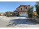 Charming two-story home featuring a two car garage and meticulously landscaped front yard at 1713 W Cottonwood Ln, Phoenix, AZ 85045