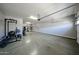 Bright and airy garage space perfect for storage or workshop with speckled epoxy flooring at 1713 W Cottonwood Ln, Phoenix, AZ 85045