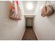 Hallway with carpet leading to possible storage and hanging tote bags at 1713 W Cottonwood Ln, Phoenix, AZ 85045