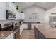 Spacious kitchen complete with stainless steel appliances and generous counter space at 17751 W Bloomfield Rd, Surprise, AZ 85388