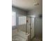 Bathroom with a modern glass-enclosed shower and separate bathtub at 18642 W Yucatan Dr, Surprise, AZ 85388