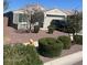 Lovely front yard displaying mature landscaping and a cozy home at 18642 W Yucatan Dr, Surprise, AZ 85388