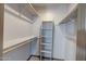 Walk-in closet offering ample storage space with shelves and hanging rods at 200 E Southern Ave # 316, Tempe, AZ 85282