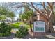 Community sign at the entrance of Chesapeake Condominiums with lush landscaping at 200 E Southern Ave # 316, Tempe, AZ 85282