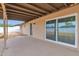 This home offers a covered patio and block wall fence for privacy at 2026 E Duke Dr, Tempe, AZ 85283