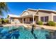 Sparkling pool and patio area, perfect for entertaining, and backyard enjoyment at 20640 N 100Th Ln, Peoria, AZ 85382