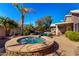 Outdoor spa with nearby landscaping, creating a peaceful and inviting atmosphere at 20640 N 100Th Ln, Peoria, AZ 85382