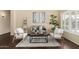 Cozy living room featuring stylish decor, a neutral color scheme, and an inviting atmosphere at 20640 N 100Th Ln, Peoria, AZ 85382